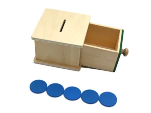 Montessori wooden coin box toy detail showcasing natural wood material and five blue discs.