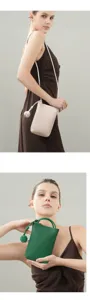 Chic genuine leather crossbody phone bag for women, elegant vertical mini bag with knot.