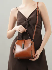 Genuine leather crossbody shoulder bag for women, large capacity commuter handbag brown.