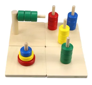 Wooden Montessori educational toy detail showing colorful stacking rings and base boards.