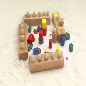 Wooden Montessori cylinder socket blocks and color matching sorting toys for kids.