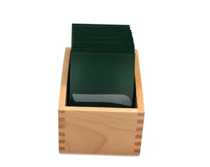 Montessori wooden sandpaper stroke boards set in storage box for early childhood education learning.