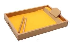Detail view of Montessori wooden sand tray for children early education and hand writing training