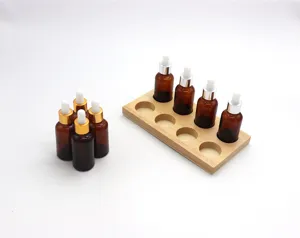 Detailed view of Montessori wooden taste bottles and holder set for sensory education.