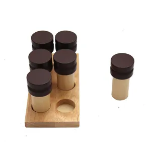 Montessori wooden sensory olfactory cylinder early education learning toy for kids and toddlers.