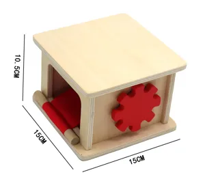 Close-up view of wooden Montessori educational toy box featuring red gear and roller design.