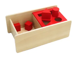 Wooden shape sorting box detail, Montessori geometric blocks for toddler early learning.