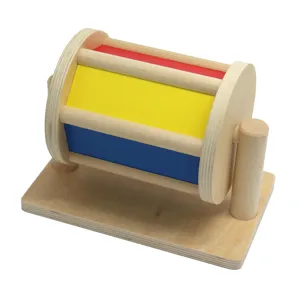 Montessori wooden spinning drum toy for early childhood color learning and sensory development.