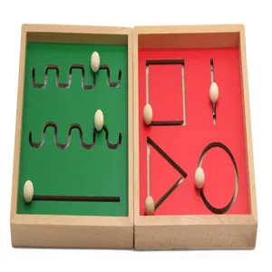 Montessori wooden bead tracking toy detail showing green and red geometric shaped sliding boards.