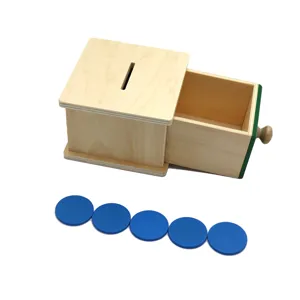 Montessori wooden coin box toy for early childhood education, durable wooden drawer with blue tokens.