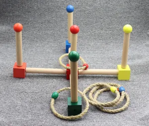 Wooden ring toss toy detail, Montessori educational game for kids hand eye coordination.