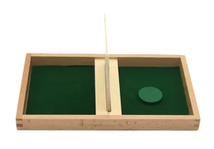 Wooden Montessori early education toy detail showing green felt tray and matching wooden disc.