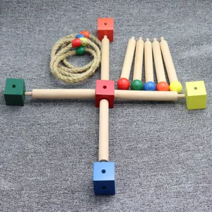Montessori wooden educational toy set for early childhood learning, ring toss and color matching.