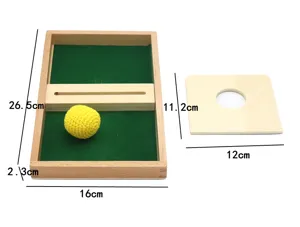 Montessori wooden sorting toy detail showing tray dimensions and insertion board with ball.