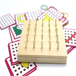 Wooden geoboard toy detail showing the structured wooden peg board and matching learning cards.