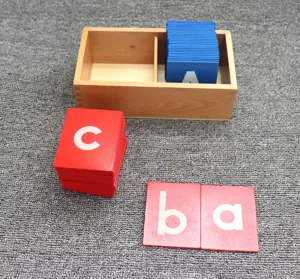 Montessori wooden sand letter board set with storage box, red and blue alphabet educational toy.