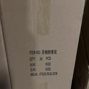 Moon phase puzzle toy packaging carton detail view showing shipping specifications and box size.