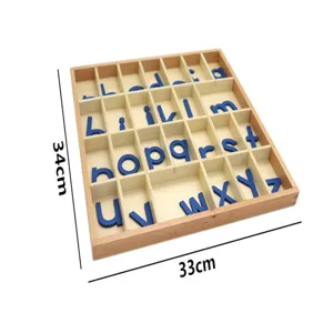Montessori wooden alphabet box detail view featuring storage compartments and blue letters.