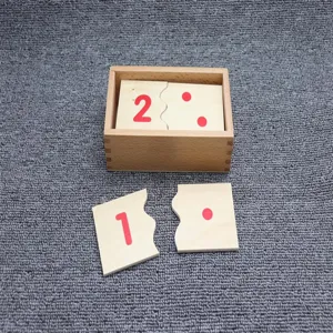Wooden Montessori math puzzle detail view showing numbered pieces and dots for early education learning.