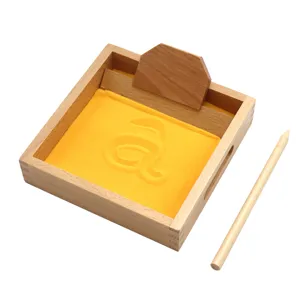 Montessori wooden sand tray for kids early learning, handwriting practice with wooden pen.