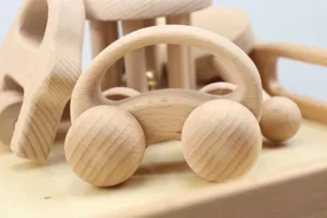 Natural solid wood baby car and rattle toy set, safe infant early education wooden playthings.
