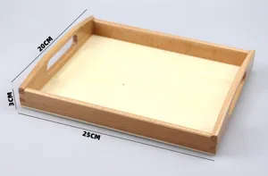 Wooden tray detail view showing natural wood grain texture and practical cut-out handles.
