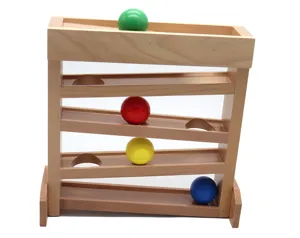 Wooden ball tracking toy detail view, multi-tier rolling ramp with colorful balls.