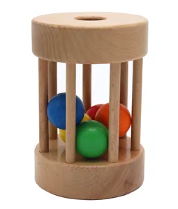 Montessori wooden rolling drum baby toy for early education, color recognition and hand-eye coordination.