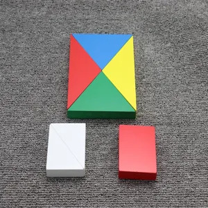 Wooden geometric shape puzzle pieces detail showing multi-color triangle blocks on grey.