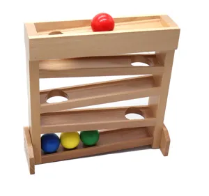 Wooden ball tracker detail view showing multi-layered tracks and colorful wooden balls for toddlers.