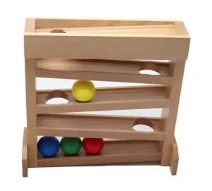 Wooden visual tracking toy detail showing multi-layer ramp and colorful rolling balls inside.