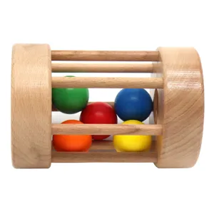 Montessori wooden rolling drum toy for infants early education and color cognition training.