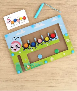 Close-up of wooden caterpillar magnetic maze toy detail showing color beads and pen.