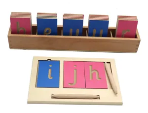 Montessori wooden grooved letter tracing board toy set for early childhood education skills.