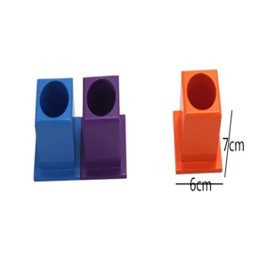 Detailed view of colorful wooden pen holder, Montessori educational toy block with hole.