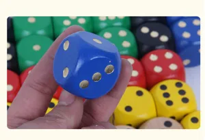 Colorful wooden dice detail shot showing 3cm solid wood game dice with dotted patterns.