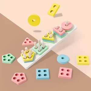 Kids wooden shape sorter toy, pastel color stacking blocks for early childhood education.