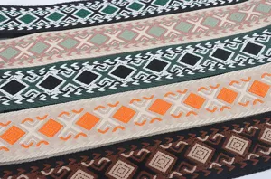Close-up view of ethnic geometric diamond woven wide bag straps in various stylish colors.