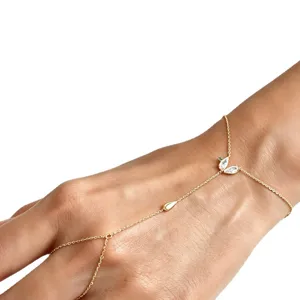 Gold slave bracelet with sparkling rhinestones and delicate chain design for women.