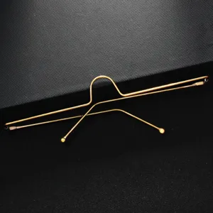Occhiali con montatura in filo metallico minimalista accessorio decorativo per feste moda.