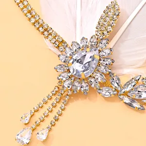 Vintage Gatsby feather rhinestone tassel headband elegant party hair accessory detail