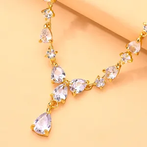 Close-up detail of luxury bridal teardrop rhinestone hair accessory with sparkling crystal stones.