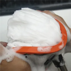 Soft car wash mop replacement head with orange frame and dense white bristles for easy cleaning.