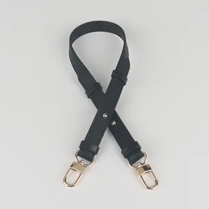 Adjustable black leather replacement shoulder strap for women handbags and shoulder bags detail.
