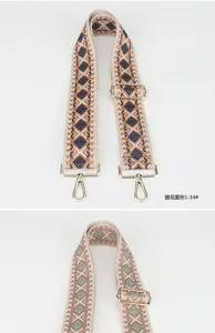 Adjustable woven bag strap replacement wide shoulder strap with ethnic diamond jacquard pattern.