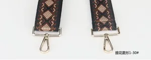 Adjustable jacquard diamond pattern wide bag shoulder strap replacement accessory detail.