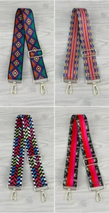 Colorful geometric pattern replacement shoulder straps detail with adjustable metal hardware.