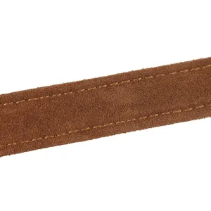 Close-up detail of brown suede leather bag strap with neat stitching design accessory.