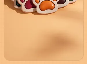 Close-up detail shot of cute leather cat paw charms, vegetable-tanned cowhide pendant.