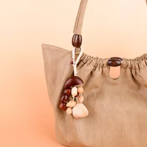 Handcrafted natural seed nut shell bag charm wind chime healing aesthetic car hanging pendant